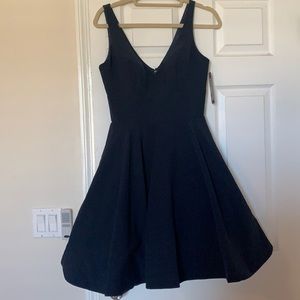 Women’s navy V-neck mini A-line dress.